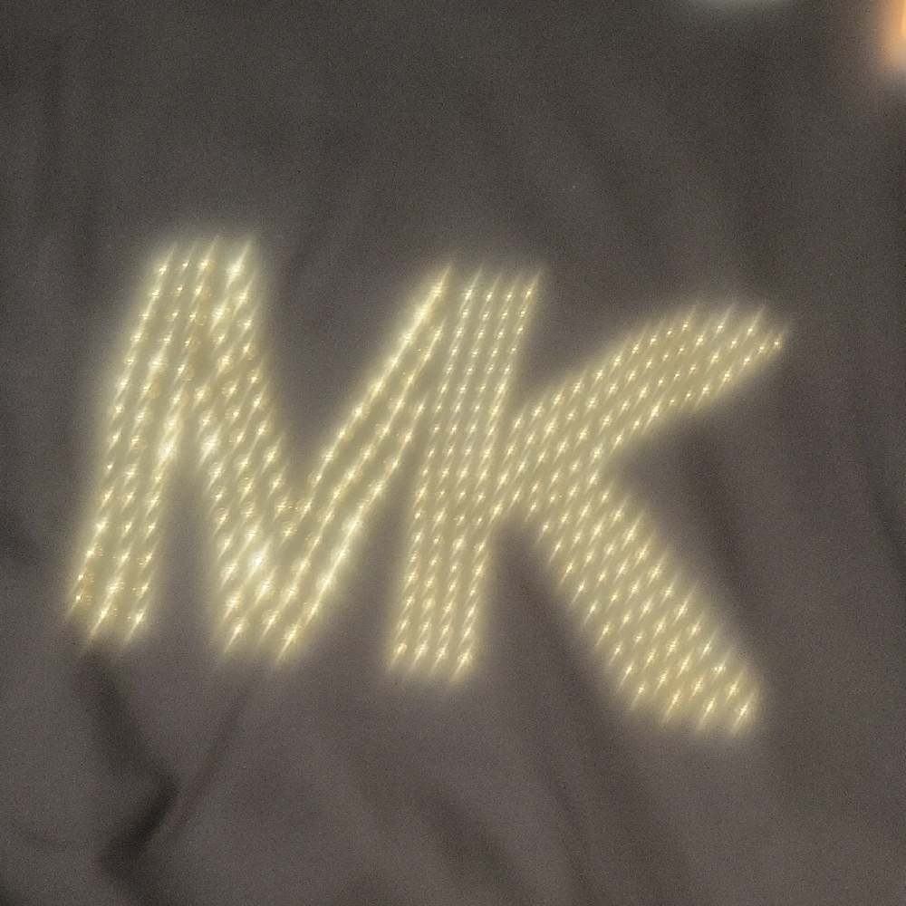 Black Tee with Gold MK Logo